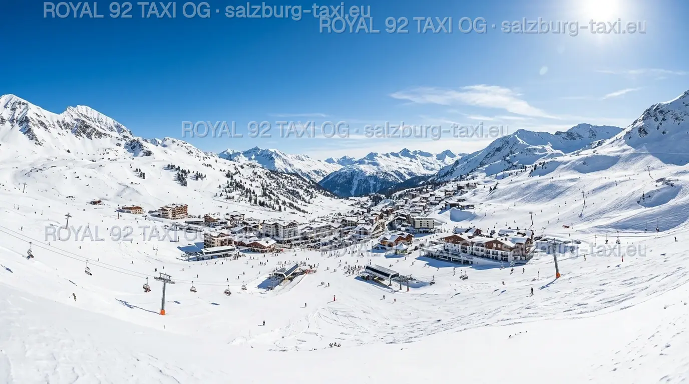Snow-covered Obertauern resort village, ski pistes and Alpine peaks