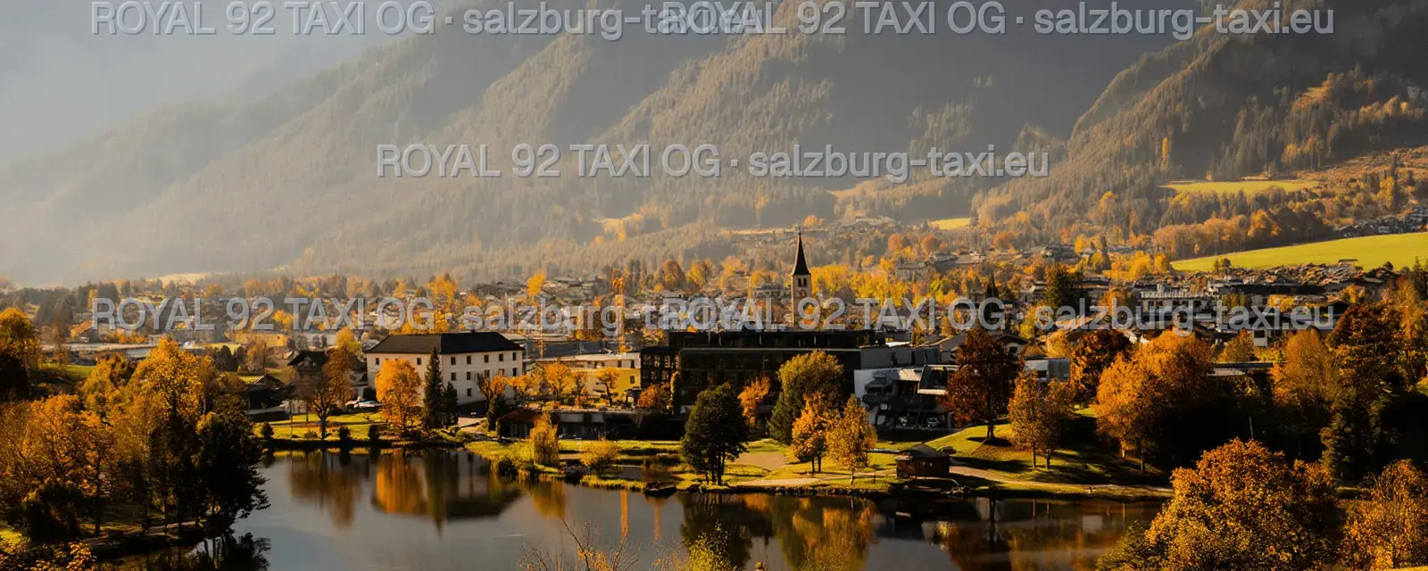 Salzburg Airport to Leogang private transfer Leogang village, church and lakeside park surrounded by the Salzburg Alps in autumn